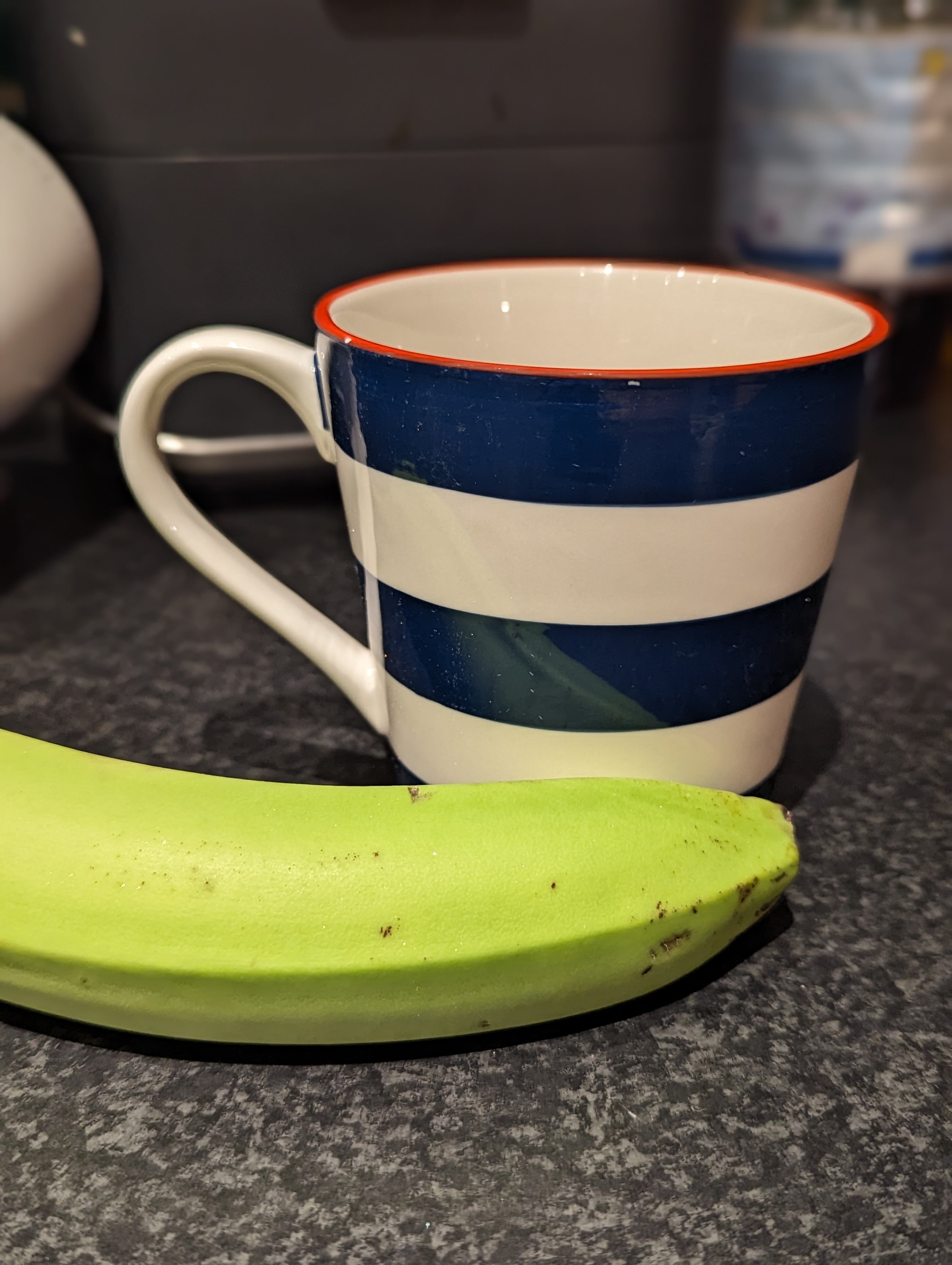 a picture of a Stripey Cup measured in banana's  for the website Bana For Scale. Image sent in byRyan H